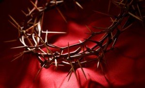 Jesus took on the world's sins by offering salvation and mending our bond with God by atoning for humanity's sins through His Blood shed on the cross.